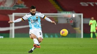 Joao Moutinho of Wolverhampton Wanderers in the liquorice allsorts away kit