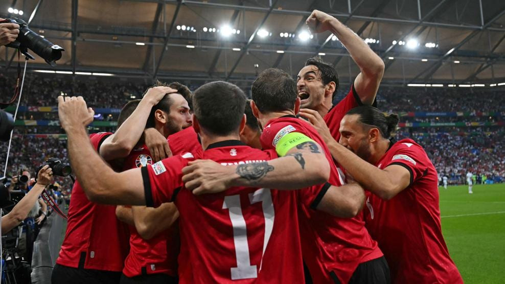 Khvicha Kvaratskhelia celebrating after scoring a goal against Portugal