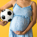 female football player getting ready to take FIFA