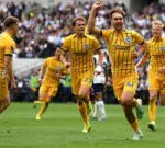 Brighton players celebrate against Tottenham