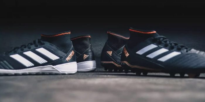Using water to stretch football boots