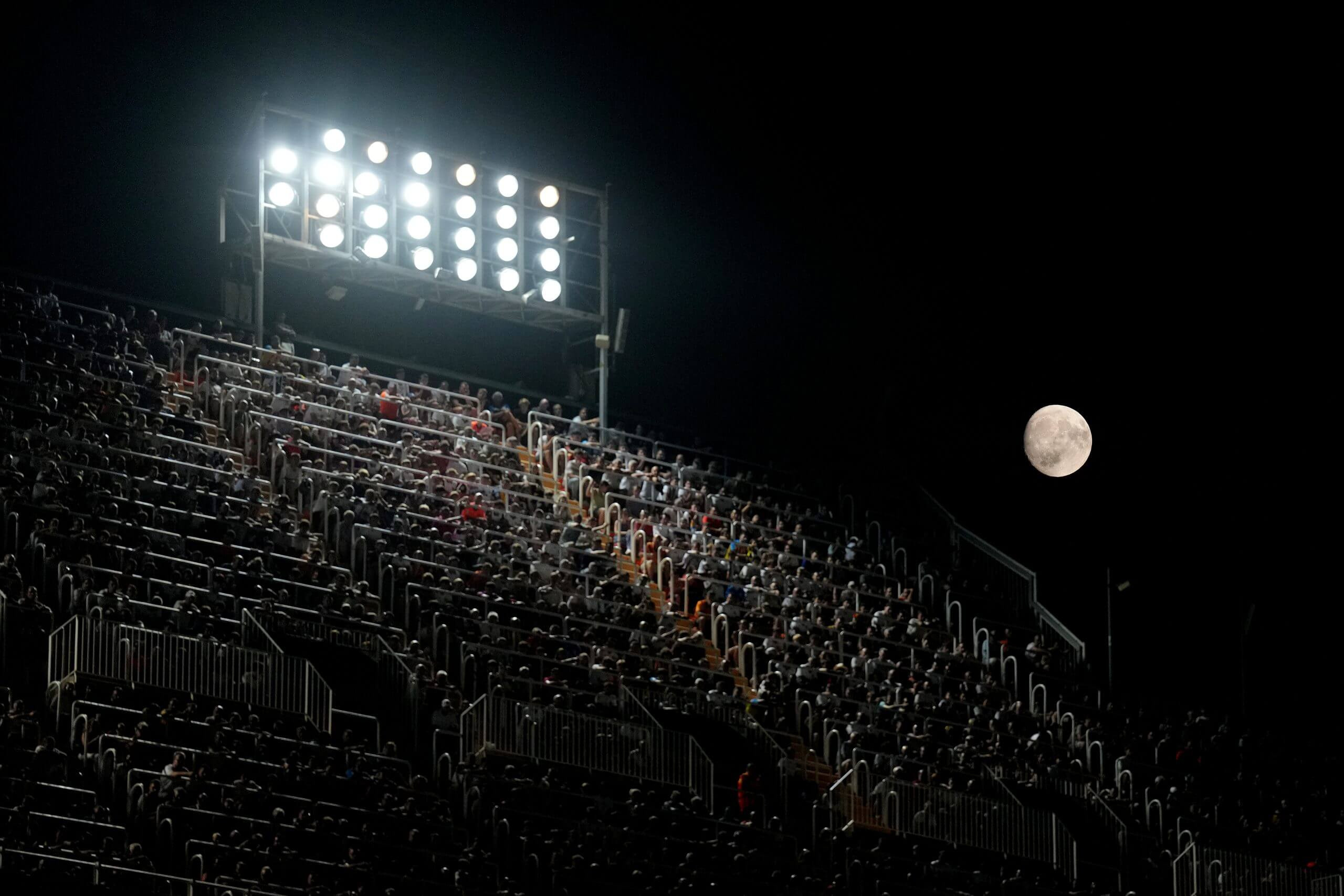 The moon appears during Valencia’s match against Barcelona in August