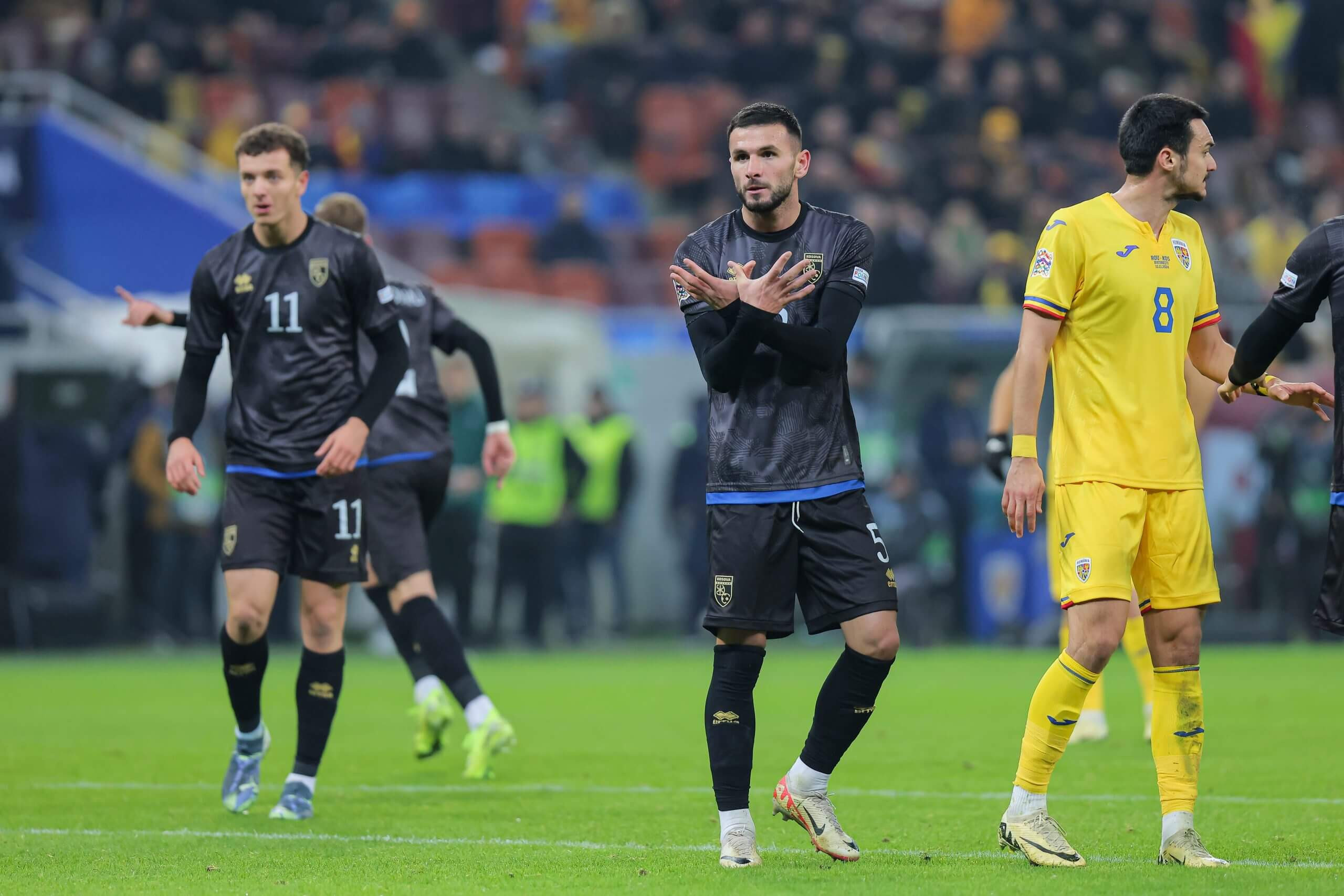 Kosovo's Dellova made the eagle gesture in the direction of the Romania fans after the chants
