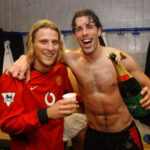 Diego Forlan and Ruud van Nistelrooy celebrating a win