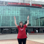 Holly in front of Old Trafford. She