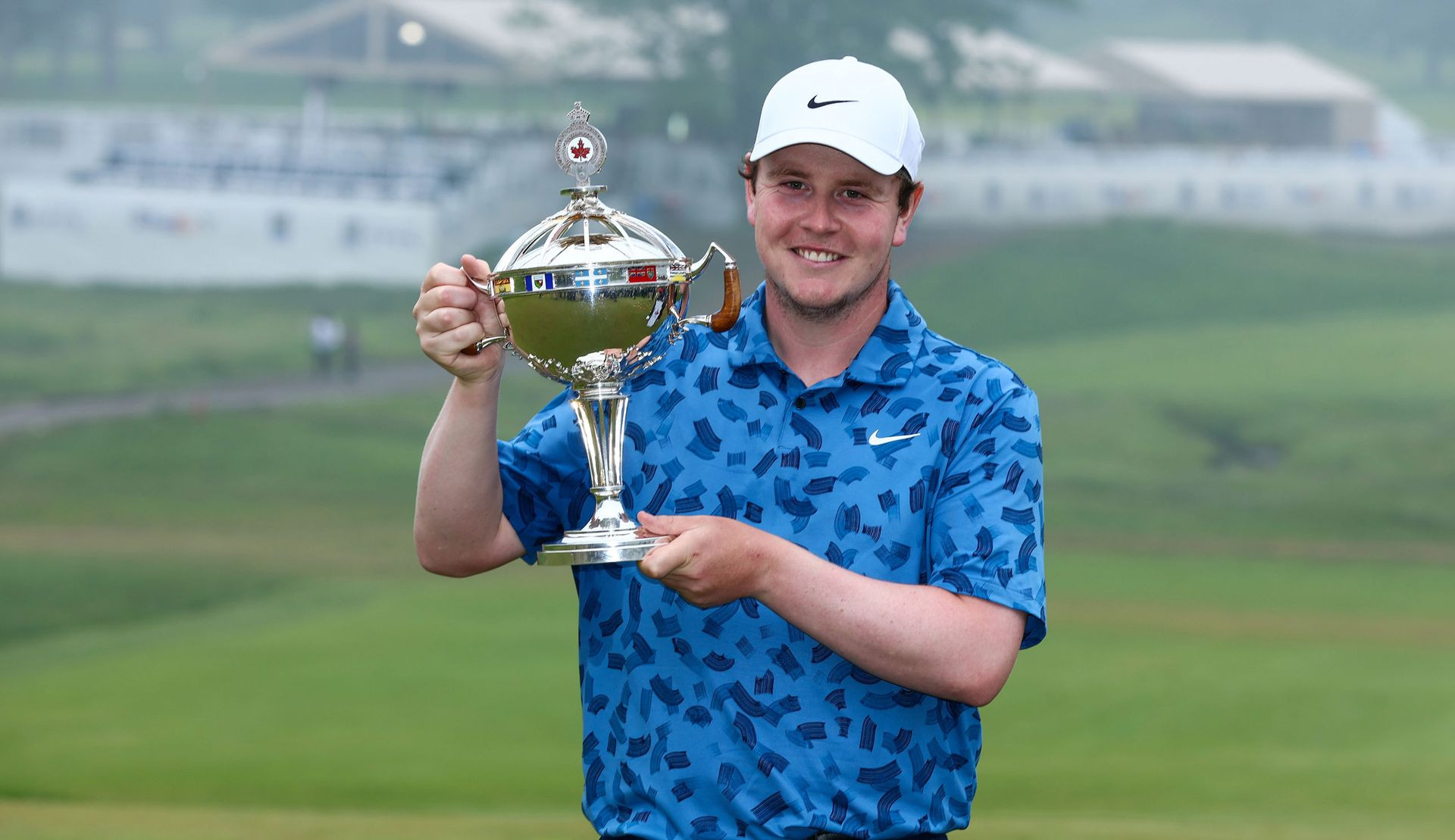 Robert MacIntyre holds the Canadian Open trophy