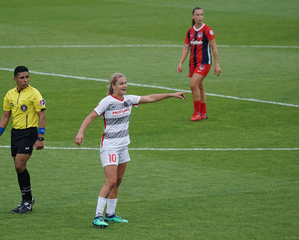 Referee signaling a foul