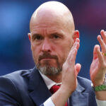 Manchester United boss Erik ten Hag applauding the supporters