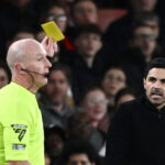 Mikel Arteta receiving a yellow card for dissent