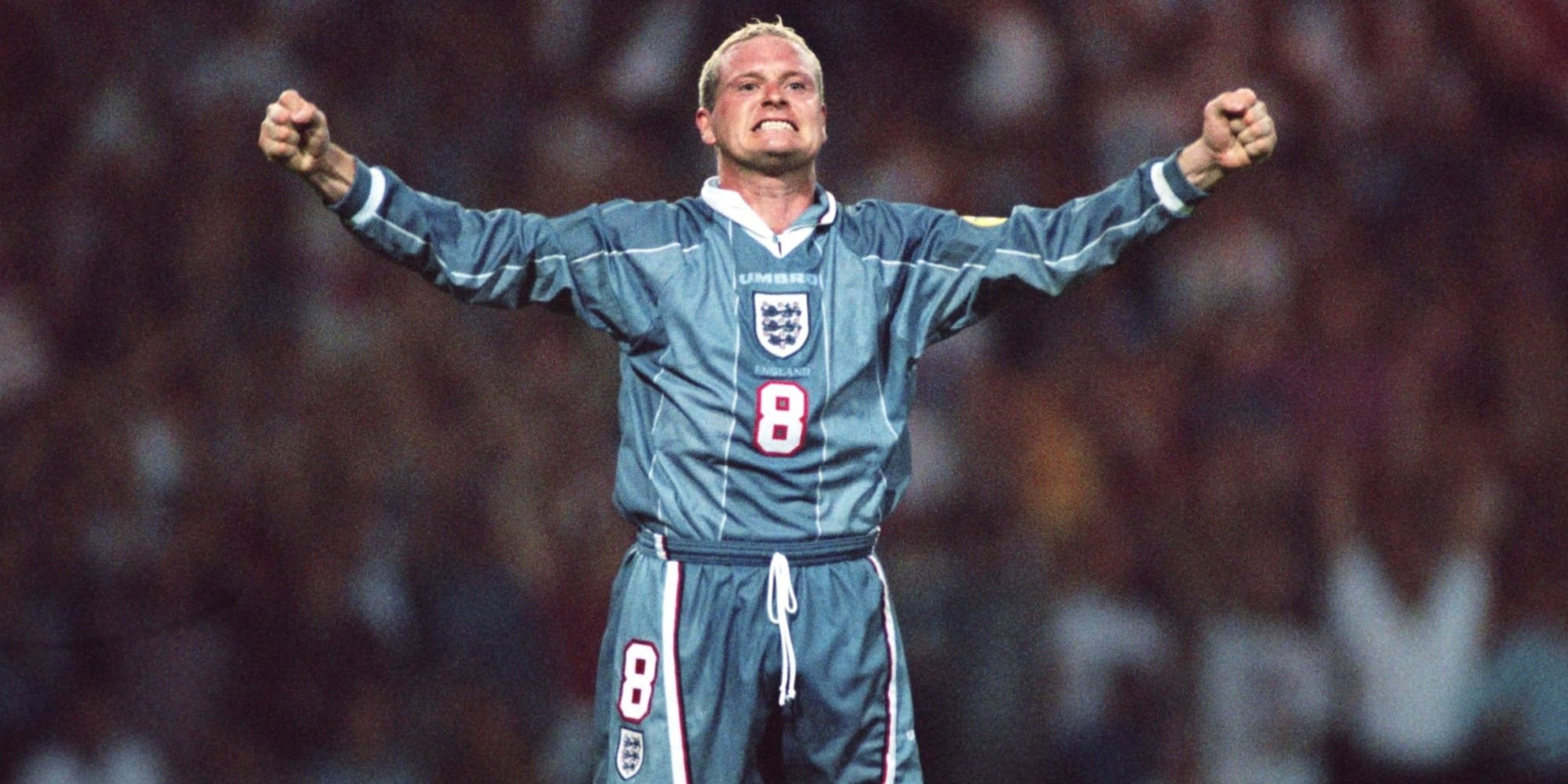 Paul Gascoigne dribbling the ball during an England match