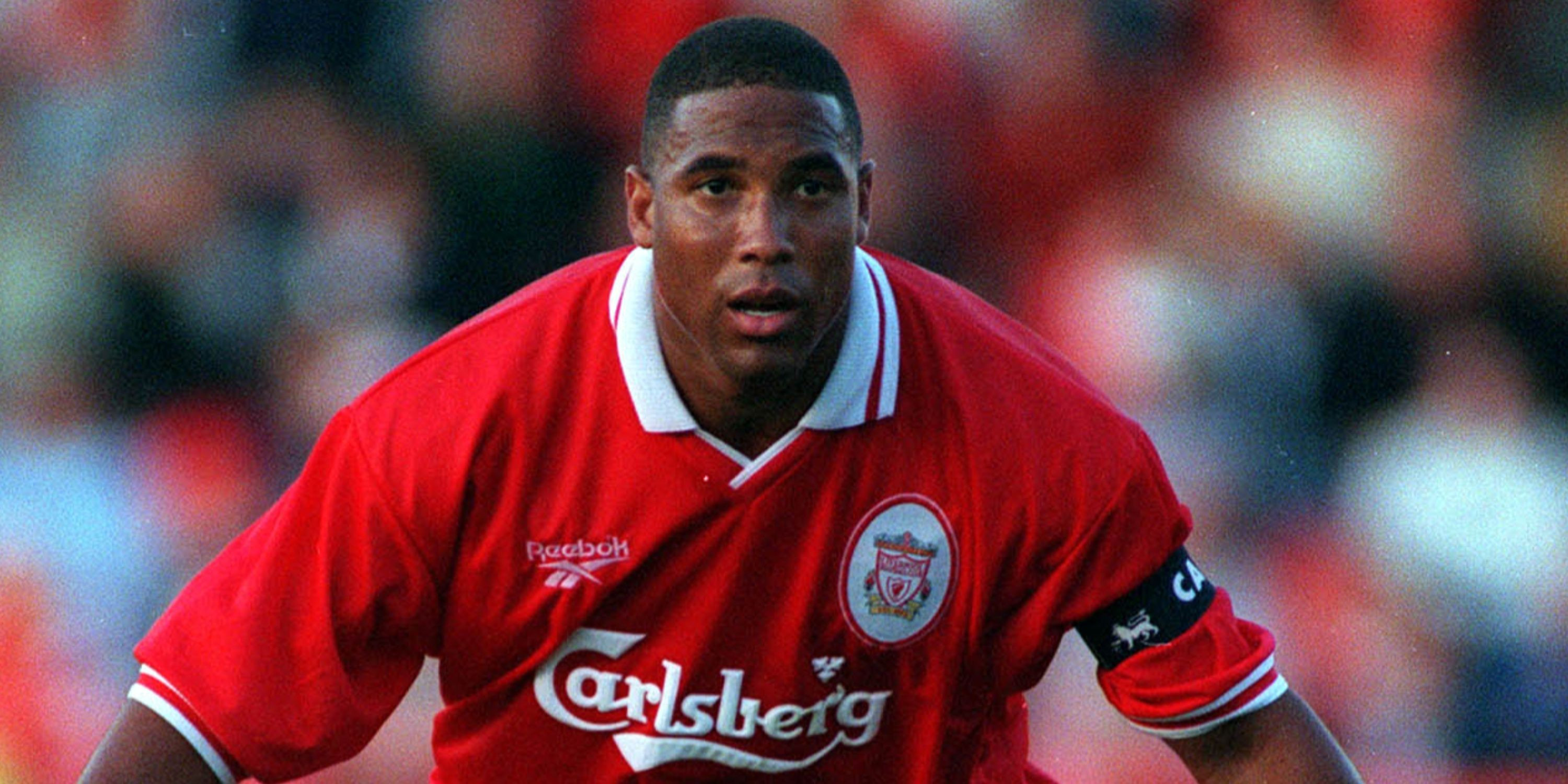 John Barnes skillfully dribbling past multiple defenders