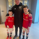 Wayne Rooney poses with Kit and Kai