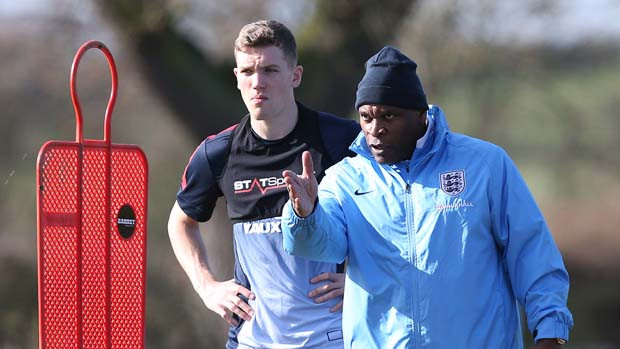 England U19s Head Coach Noel Blake works with his players on the training ground
