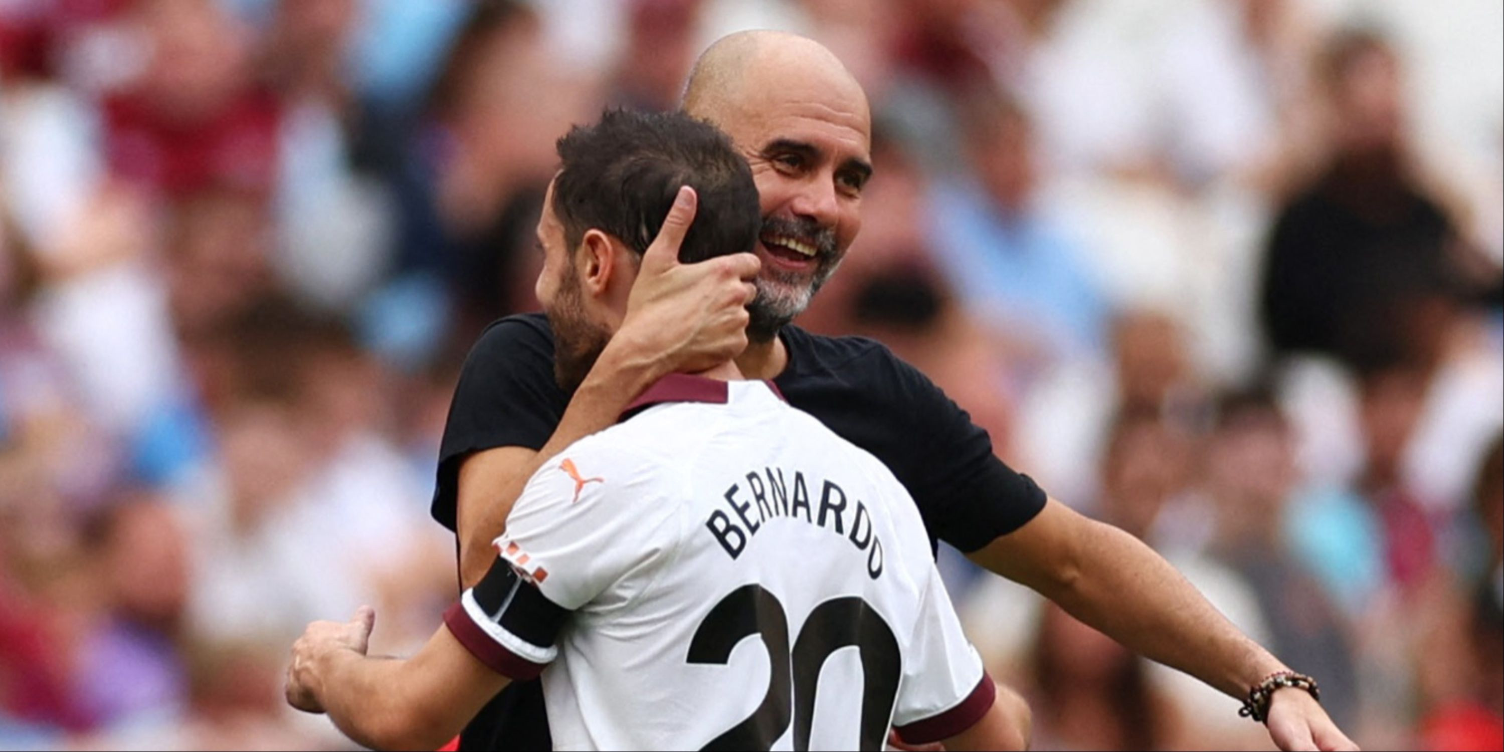 Pep Guardiola hugging Bernardo Silva
