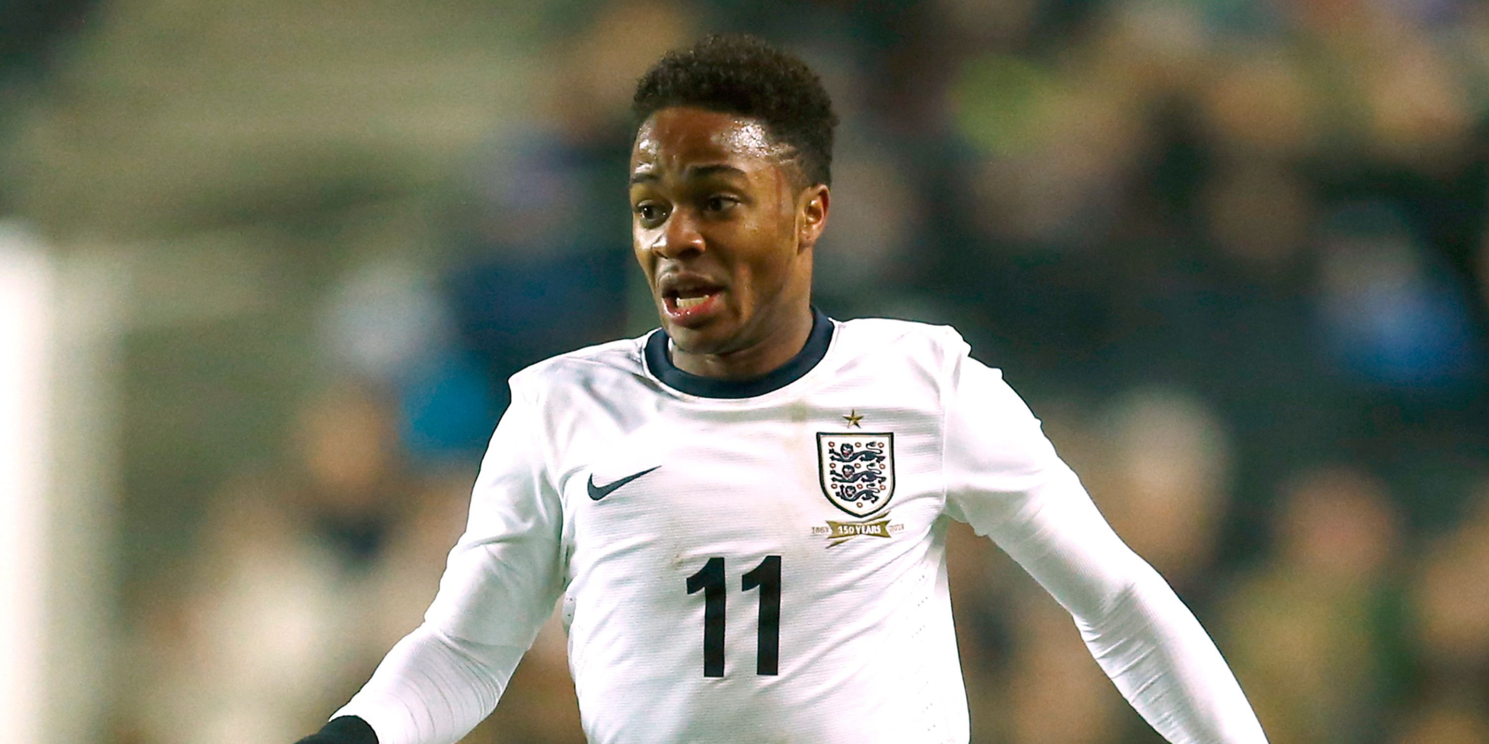 A young Raheem Sterling in action for England