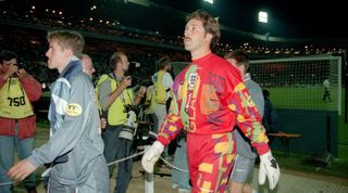David Seaman of England looking disappointed in the garish goalkeeper kit