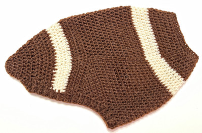 Two finished crochet football sweaters