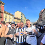 Will Shearer, center, poses in Milan ahead of Champions League clash