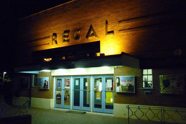 Outside the front of the Regal Theatre at night time
