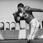 Woody Strode and Kenny Washington in vintage NFL action, showcasing their historic integration of the league.