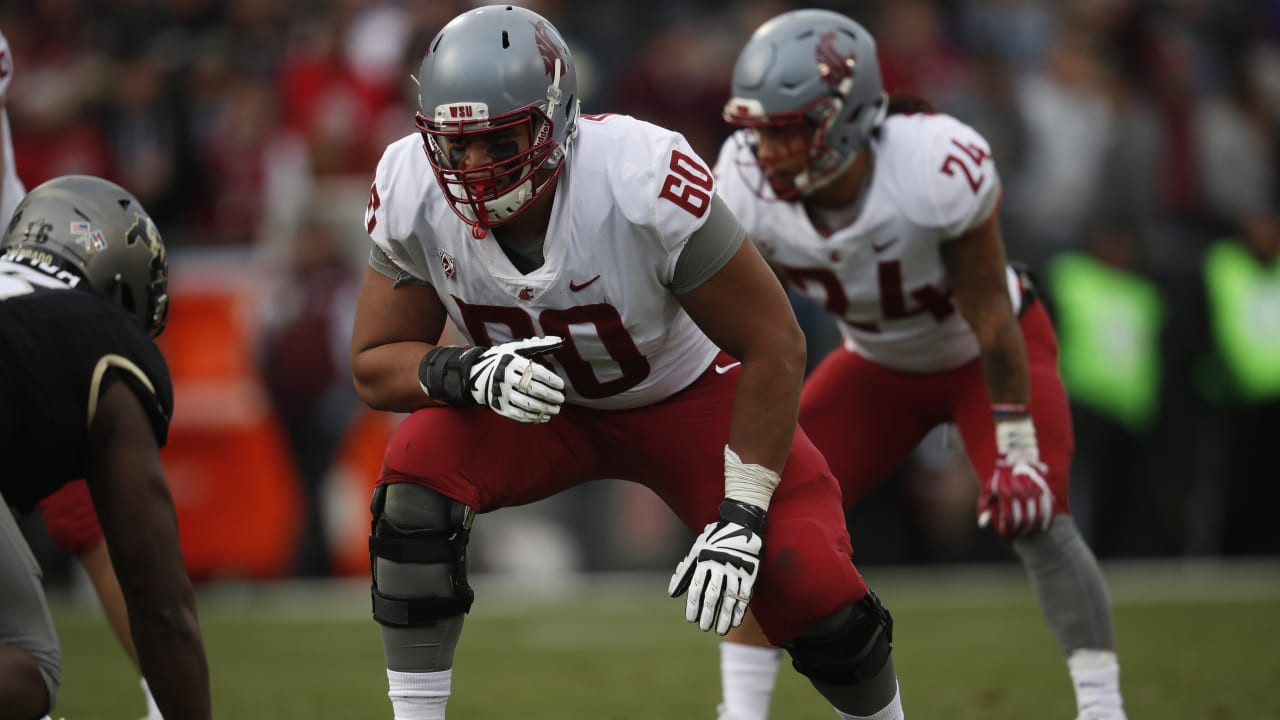 Offensive lineman blocking during a football game