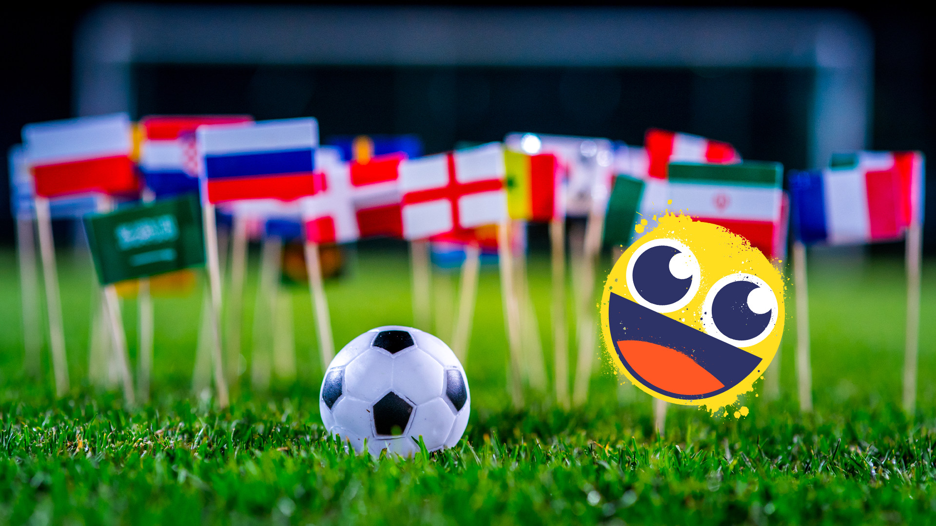 World flags on a football field representing the 2026 World Cup